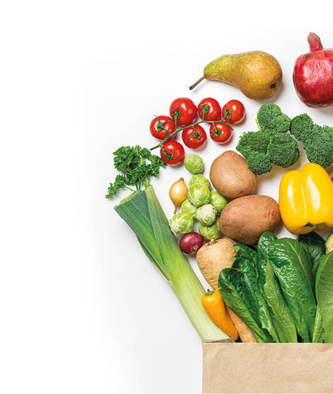 Healthy food background. Healthy food in paper bag vegetables and fruits on white. Food delivery, shopping food supermarket concept