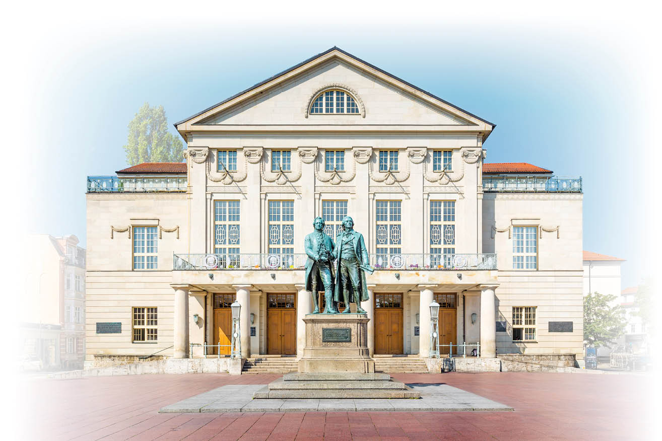 Classic view of famous Deutsches Nationaltheater with Goethe-Schiller monument on a beautiful sunny day with blue sky in Weimar, Thuringia, Germany