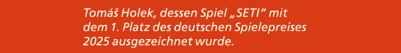 Tom  Holek, dessen Spiel „SETI“ mit dem 1. Platz des deutschen Spielepreises 2025 ausgezeichnet wurde.